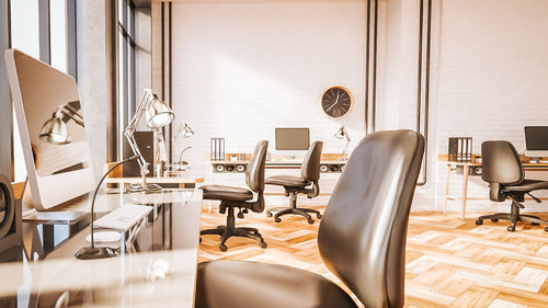 Modern office interior of Excel therapy Sercies with desks and chairs