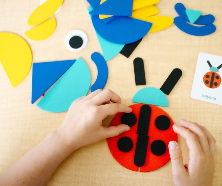 child's hands shown playing with occupational therapy toy